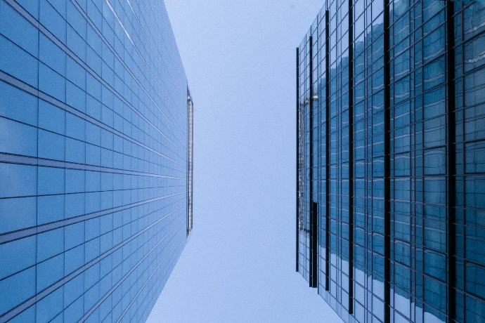 a couple of tall buildings next to each other